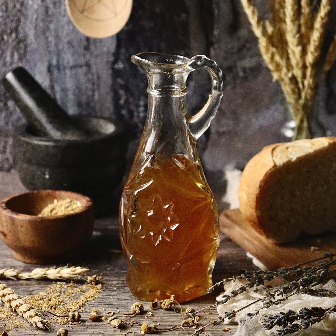 An amber colored chamomile syrup in an anchor hocking glass