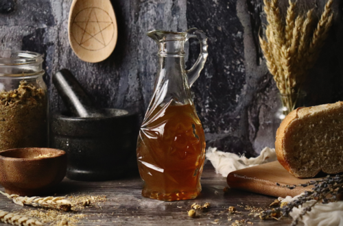 A chamomile simple syrup ina decorative pouring bottle