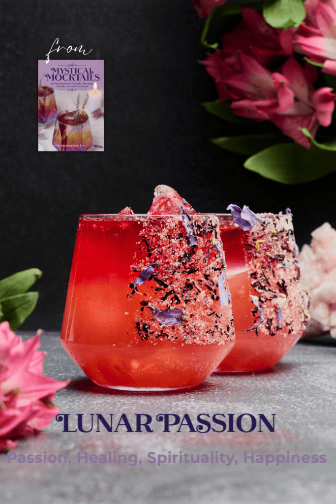 Floral hibiscus nonalcoholic love potion drink or mocktail with Himalayan salt and dried flower petal rim.