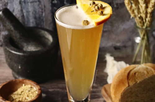 A lemon chamomile shandy in a tall glass