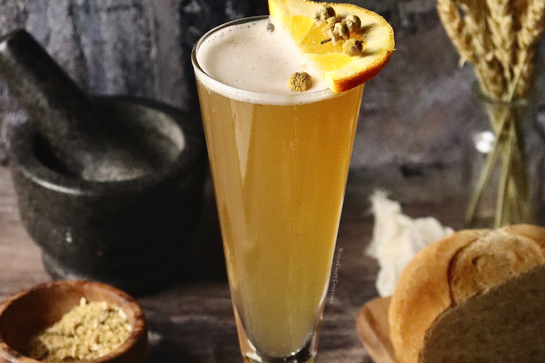 A lemon chamomile shandy in a tall glass