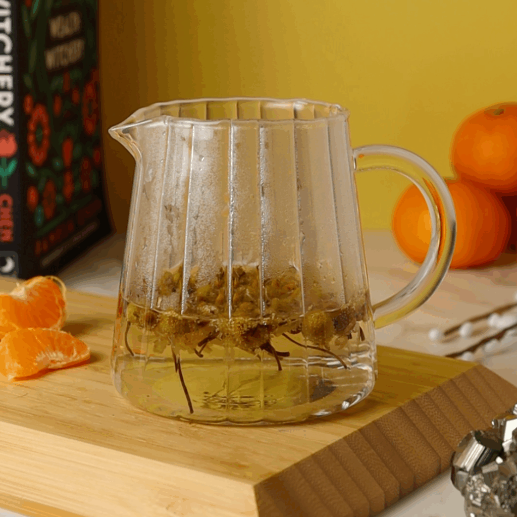 Small Creamer Pitcher filled with chamomile tea